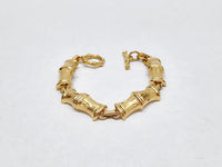 Monet Brushed Gold Tone Bamboo Link Bracelet  - Hers and His Treasures