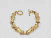 Monet Brushed Gold Tone Bamboo Link Bracelet  - Hers and His Treasures