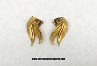 www.hersandhistreasures.com/products/1955-1971-marcel-boucher-gold-tone-clip-on-earrings