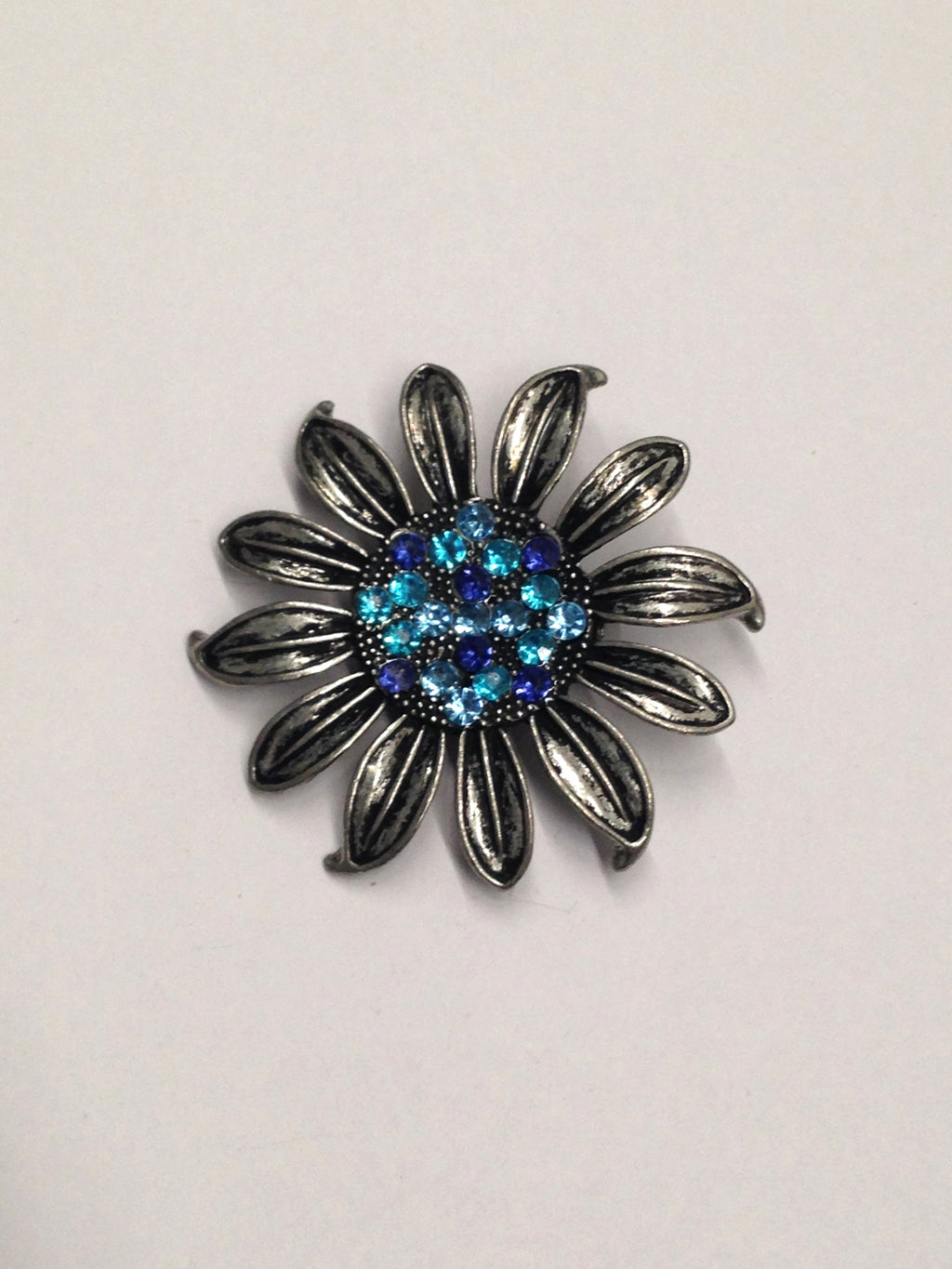 Flower Brooch With Blue Rhinestone Center – Hers and His Treasures